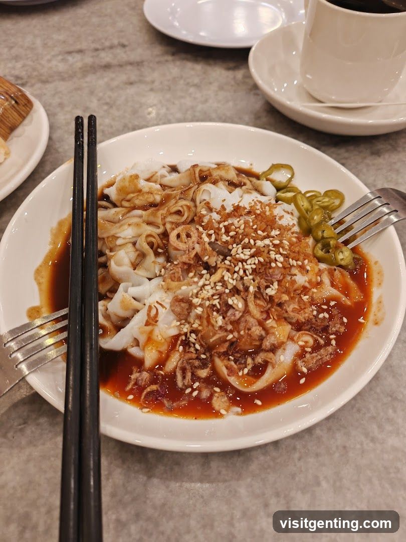 Chee Cheong Fun with Chili and Sesame Seeds