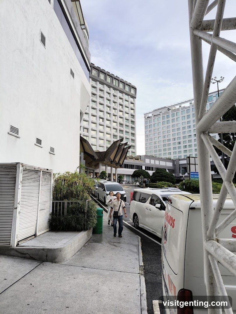 People walking past a hotel entrance