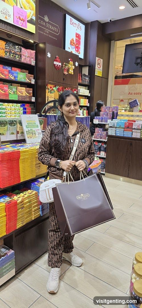 Woman holding shopping bags in a chocolate store