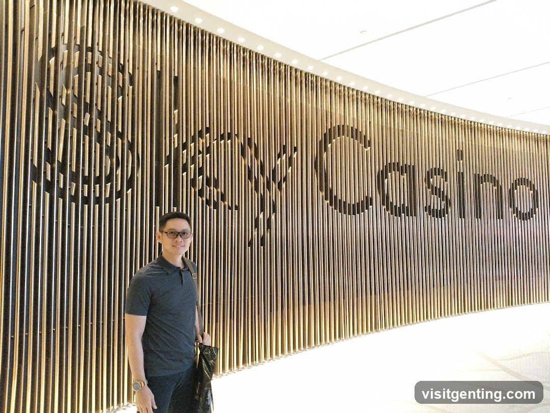Man Poses in Front of a Casino Sign