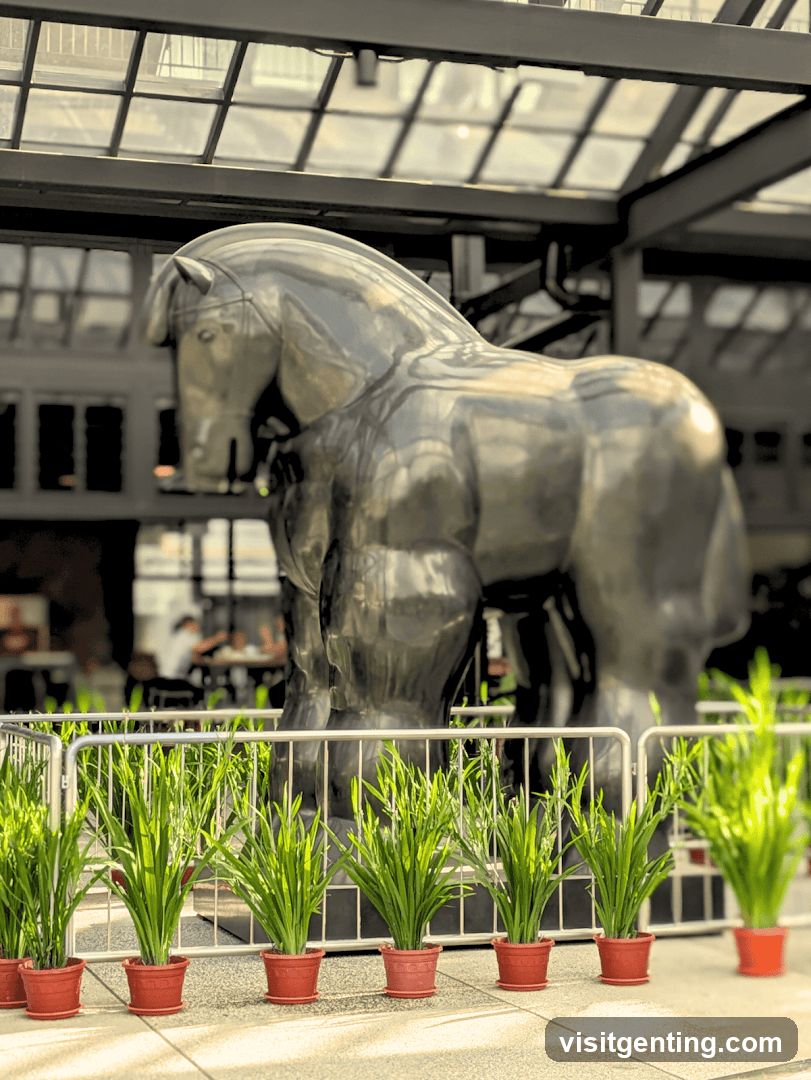 Sculpture of a horse in front of a building