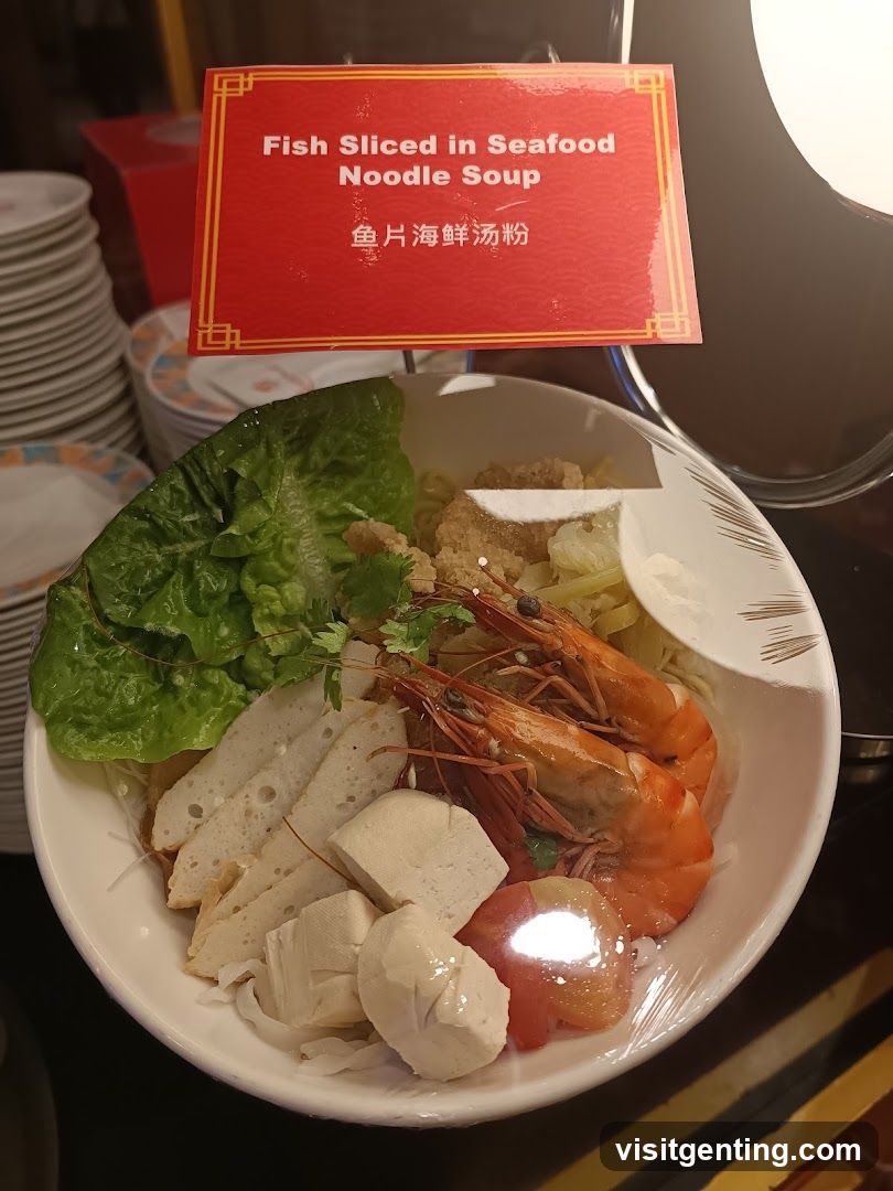 Fish Sliced in Seafood Noodle Soup
