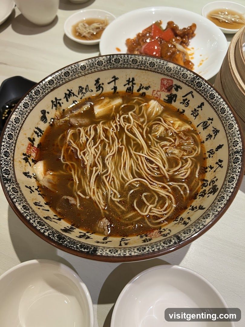 Dining Table with Noodles and Side Dishes