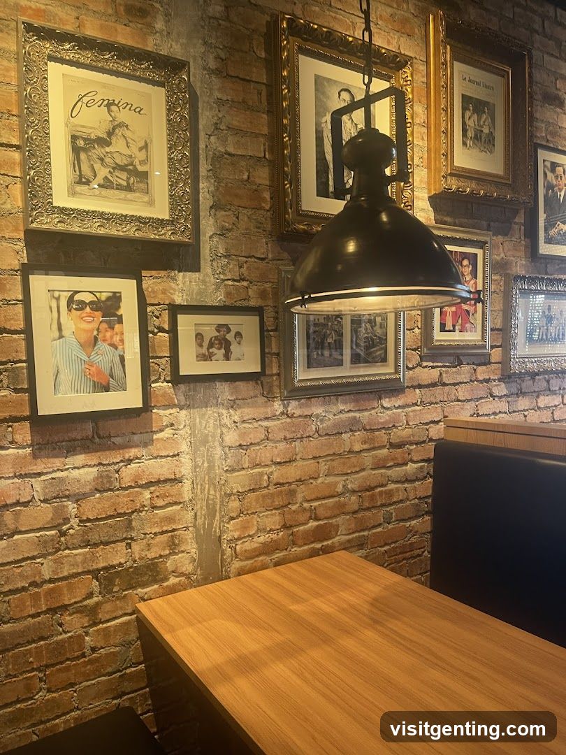 Brick Wall Interior with Framed Photos and Pendant Light