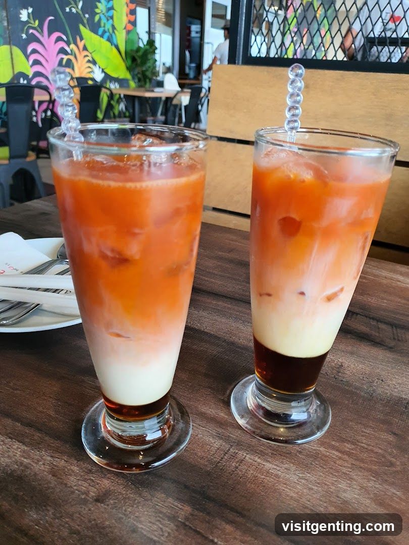 Two Iced Drinks on Wooden Table