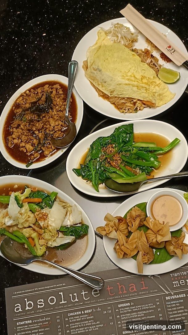 Table with Thai dishes and menu