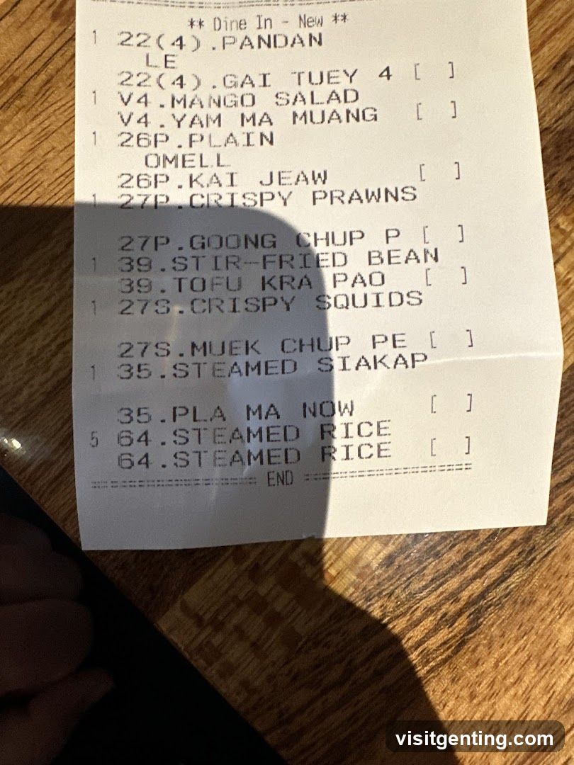 Restaurant Receipt on Wooden Surface