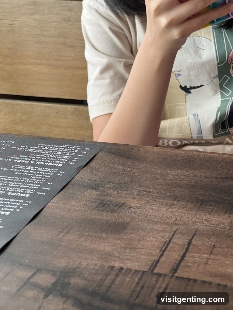Person at table with menu