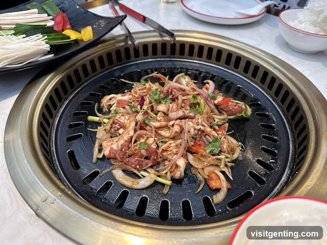 Grilled meat and vegetables on a Korean BBQ grill