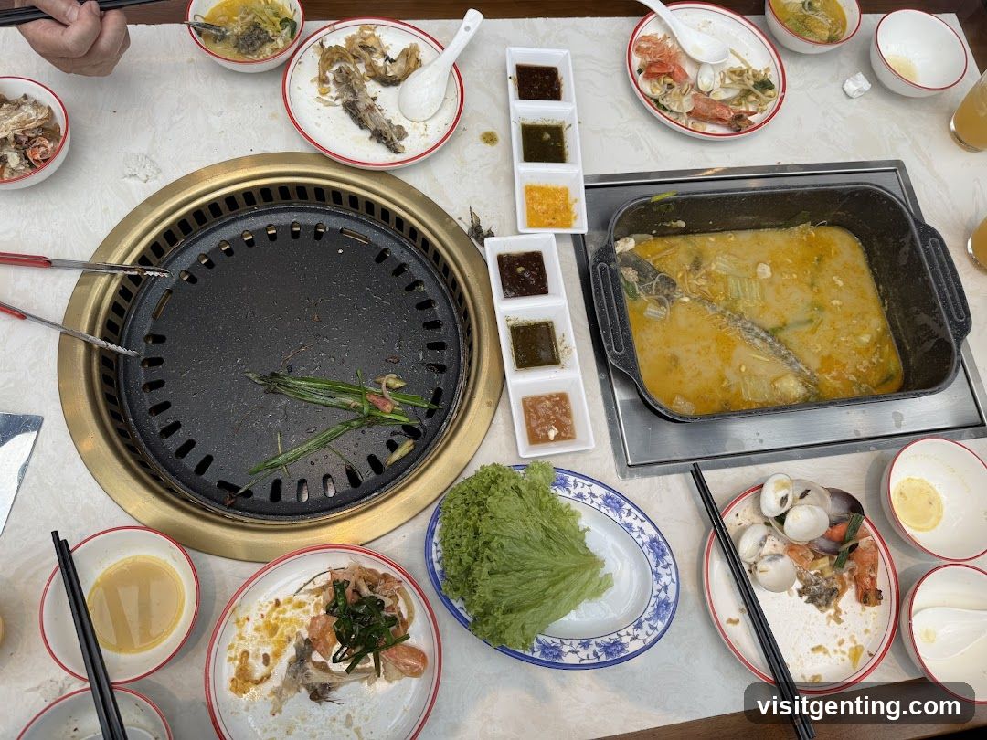 Dining table with barbecue and seafood dishes