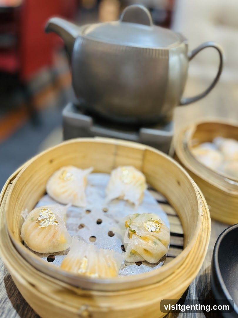 Dumplings and Teapot in Bamboo Steamer