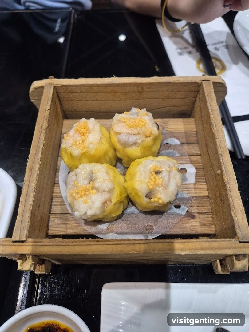 Dumplings in wooden steamer box