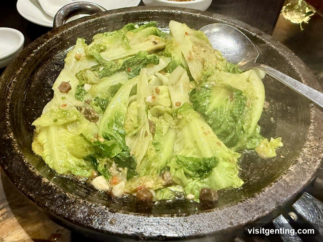 Stir-fried lettuce in a stone pot