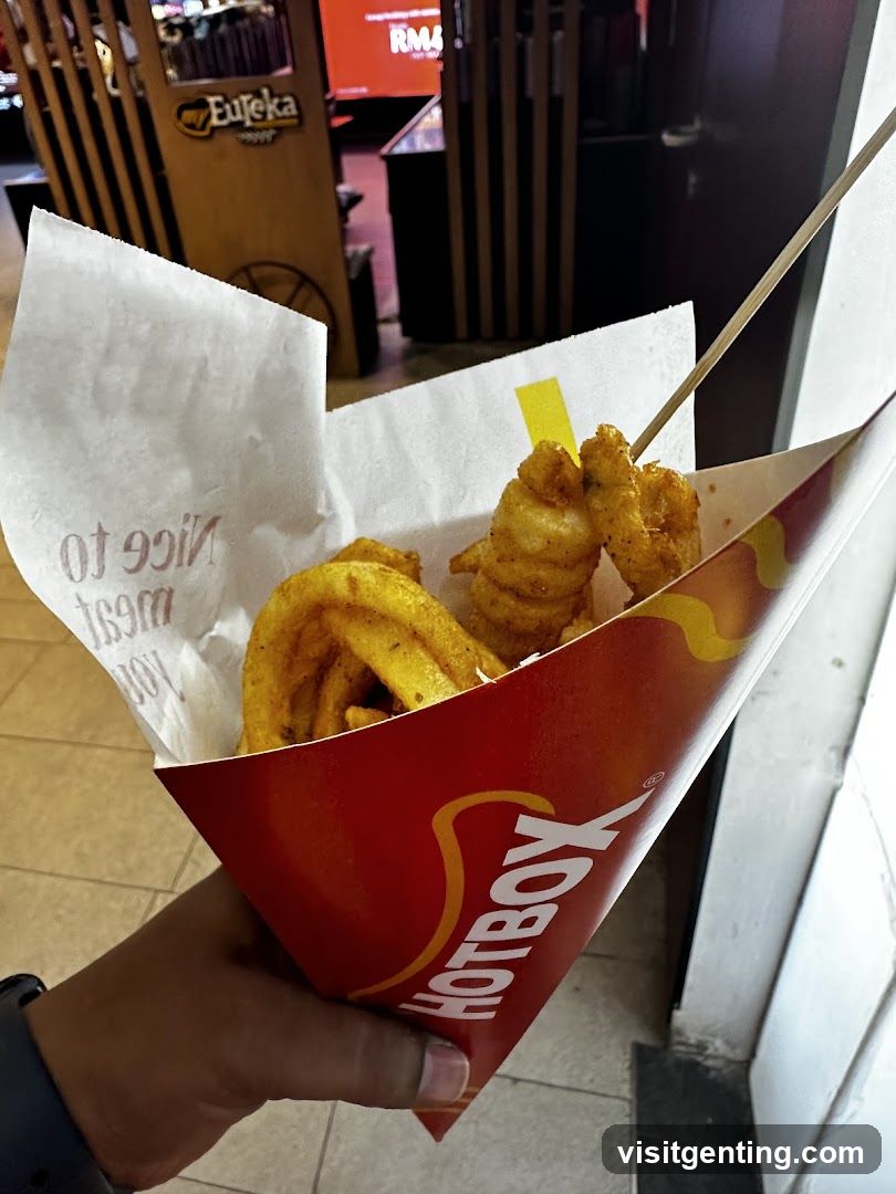 Hand holding Hotbox food container