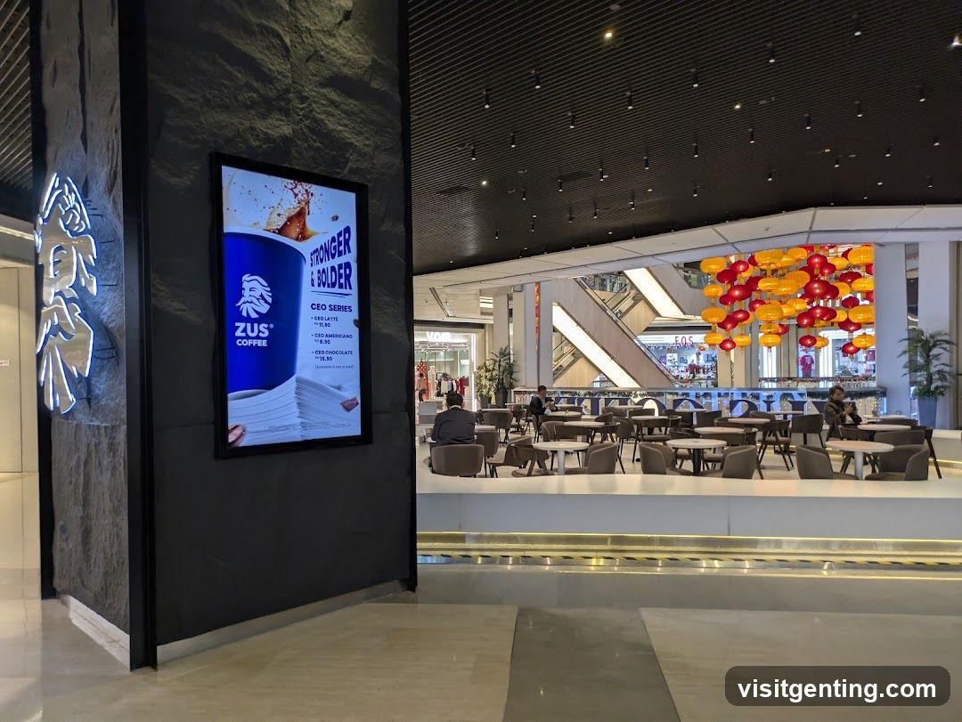 Interior of a shopping mall with coffee shop signage