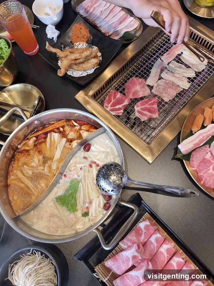 Grilled meat and hot pot dining setup