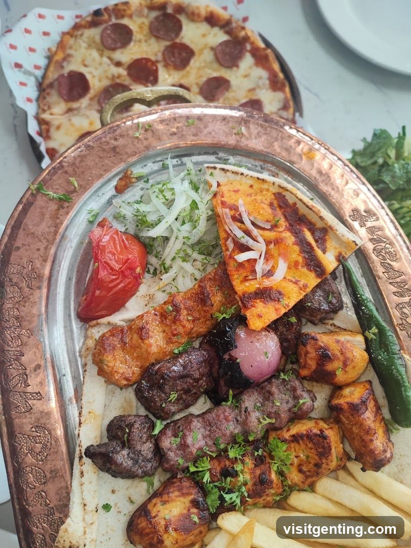 Food Plate with Grilled Meats and Side Dishes