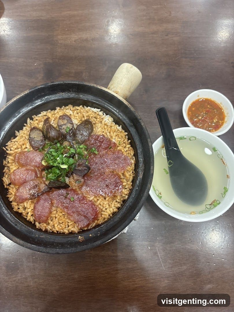 Food served in a clay pot with side dishes