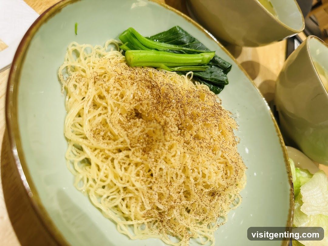 Noodles with greens on a plate