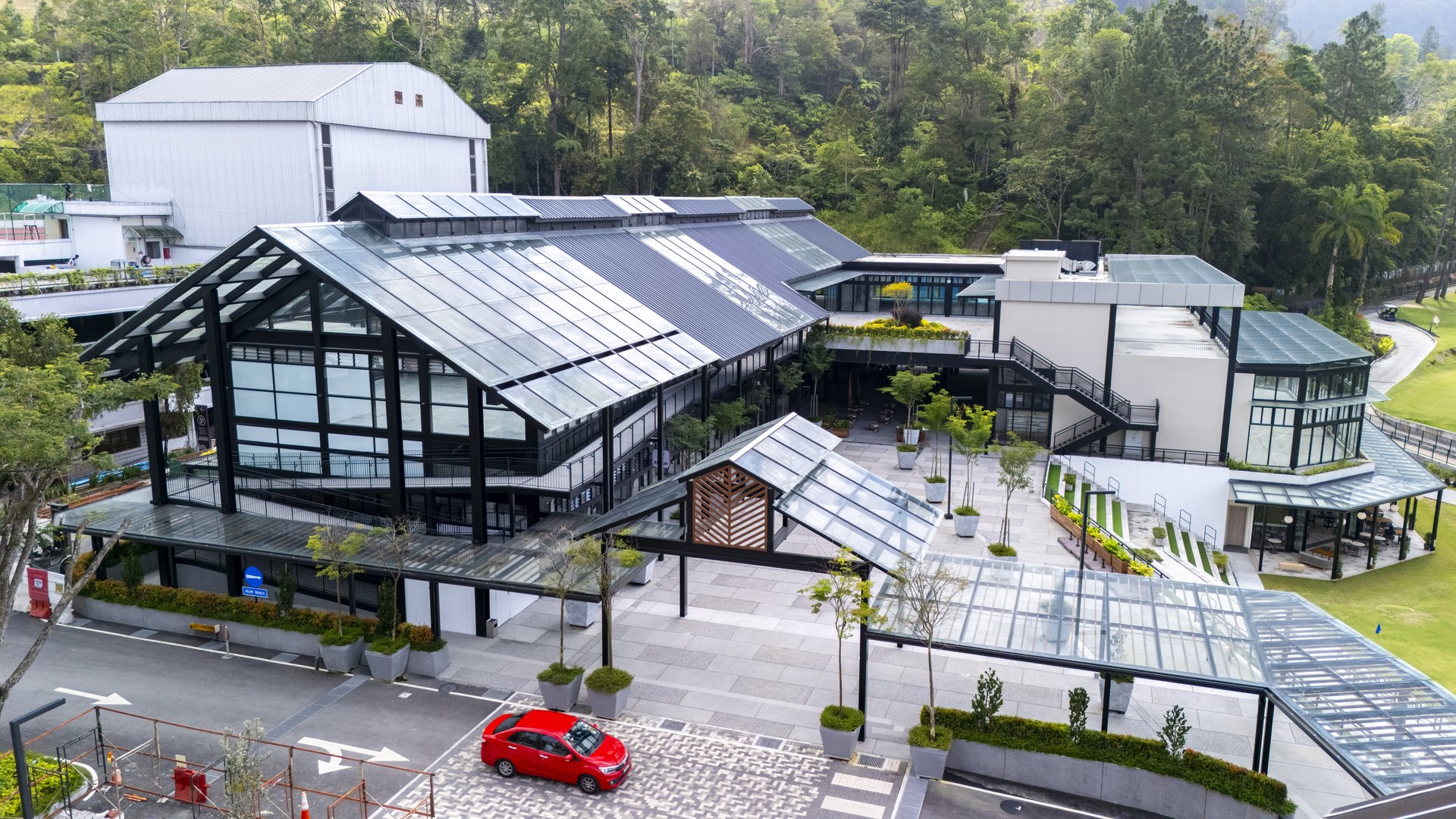 Awana Village glass buildings and courtyard at Resorts World Awana, mid-hill Genting Highlands, where The Lodge BBQ is held